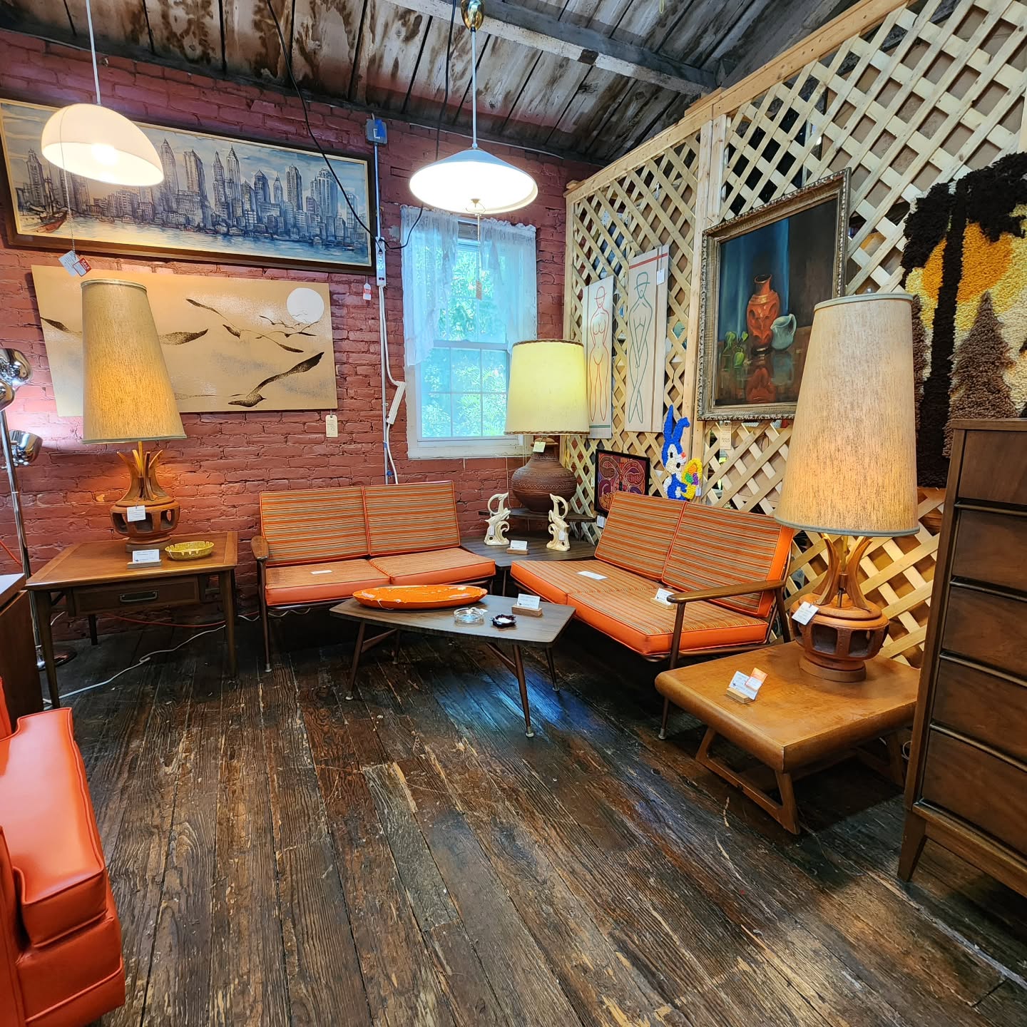 21. Mid-century Meets Metropolis: Sleek Walnut Console and Geometric Wall Art Fusion