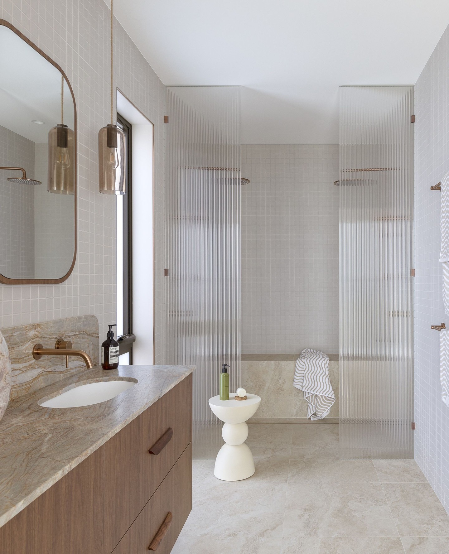 3. Vibrant Red Wall Accent with Retro Chrome Fixtures and Checkerboard Floor