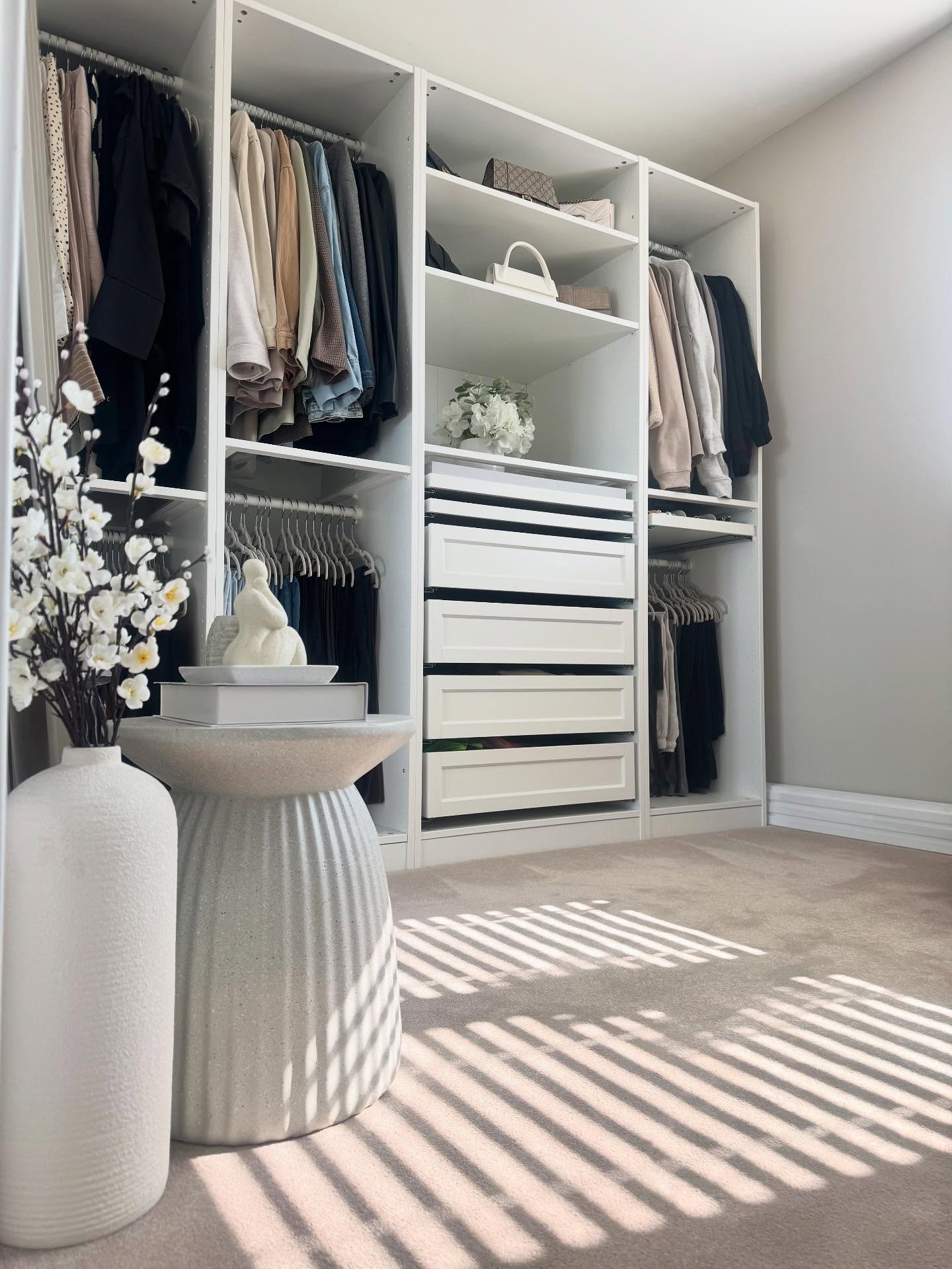 10. the Interwoven Wooden Panels and Geometric Ceiling Of a Modern Walk-in Wardrobe