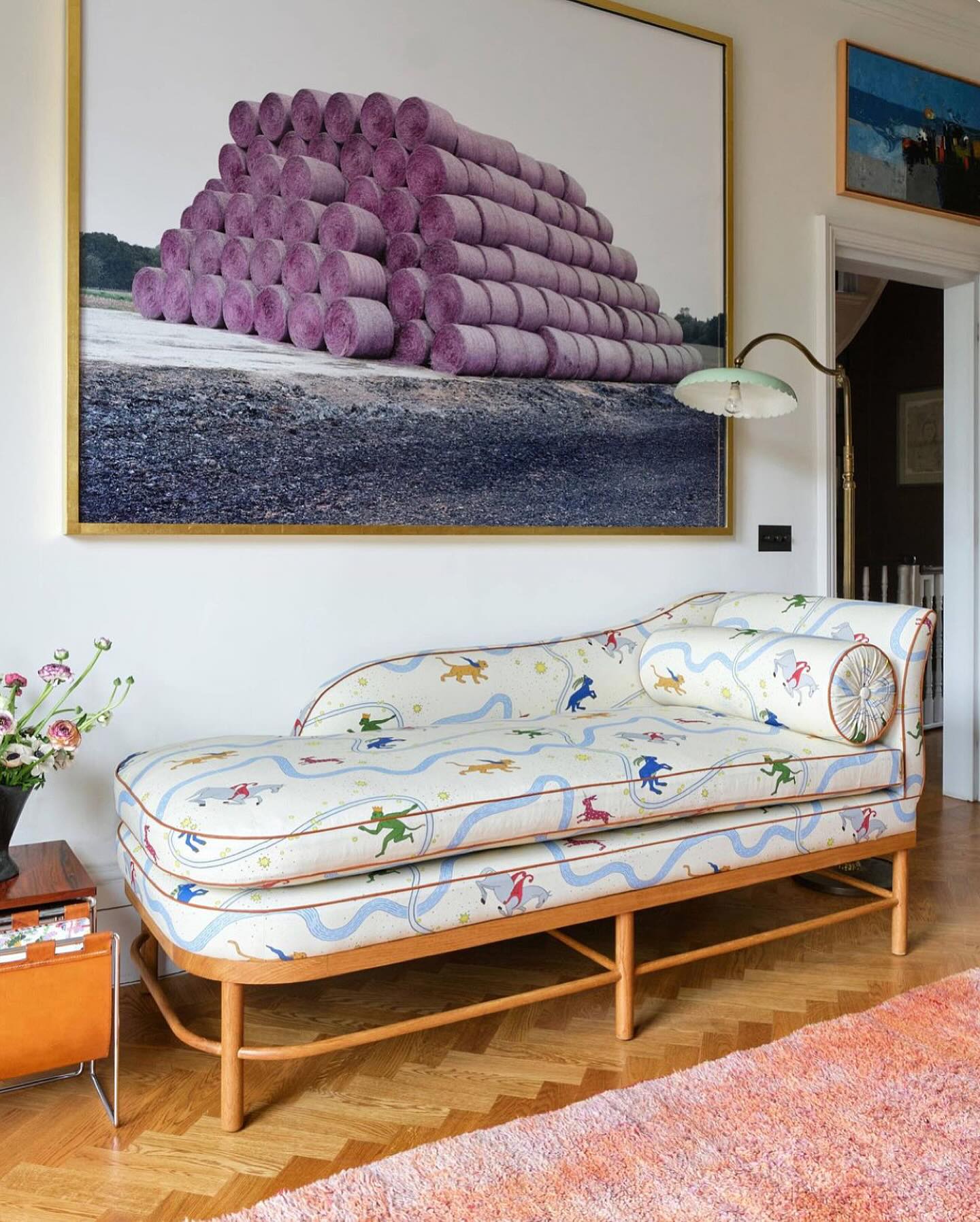 5. Tangerine Dream Daybed with Geometric White Quilt and Industrial Pendant Light