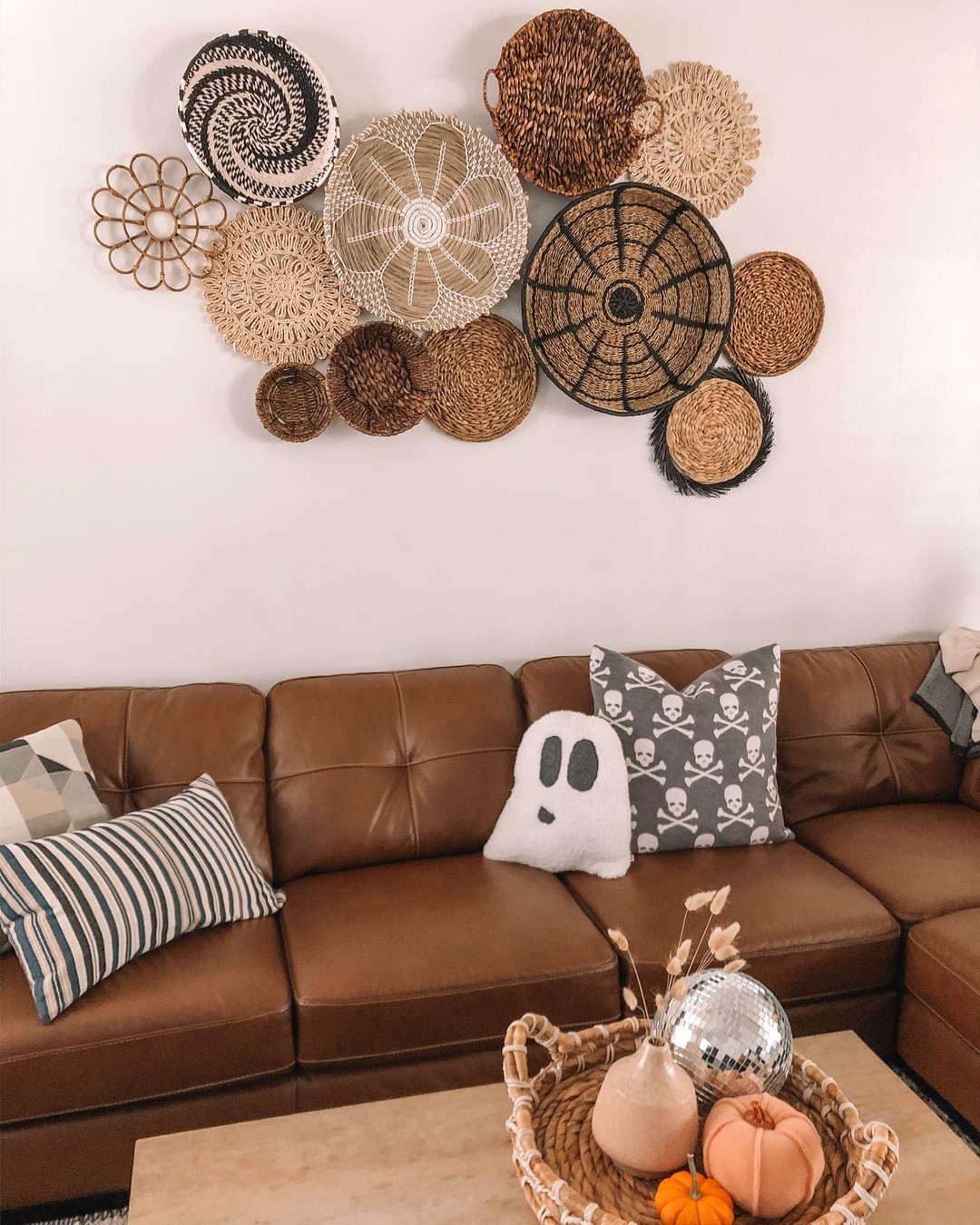 12. Vibrant Geometric Tapestry with Cobalt Blue Accents Above a Minimalist White Couch