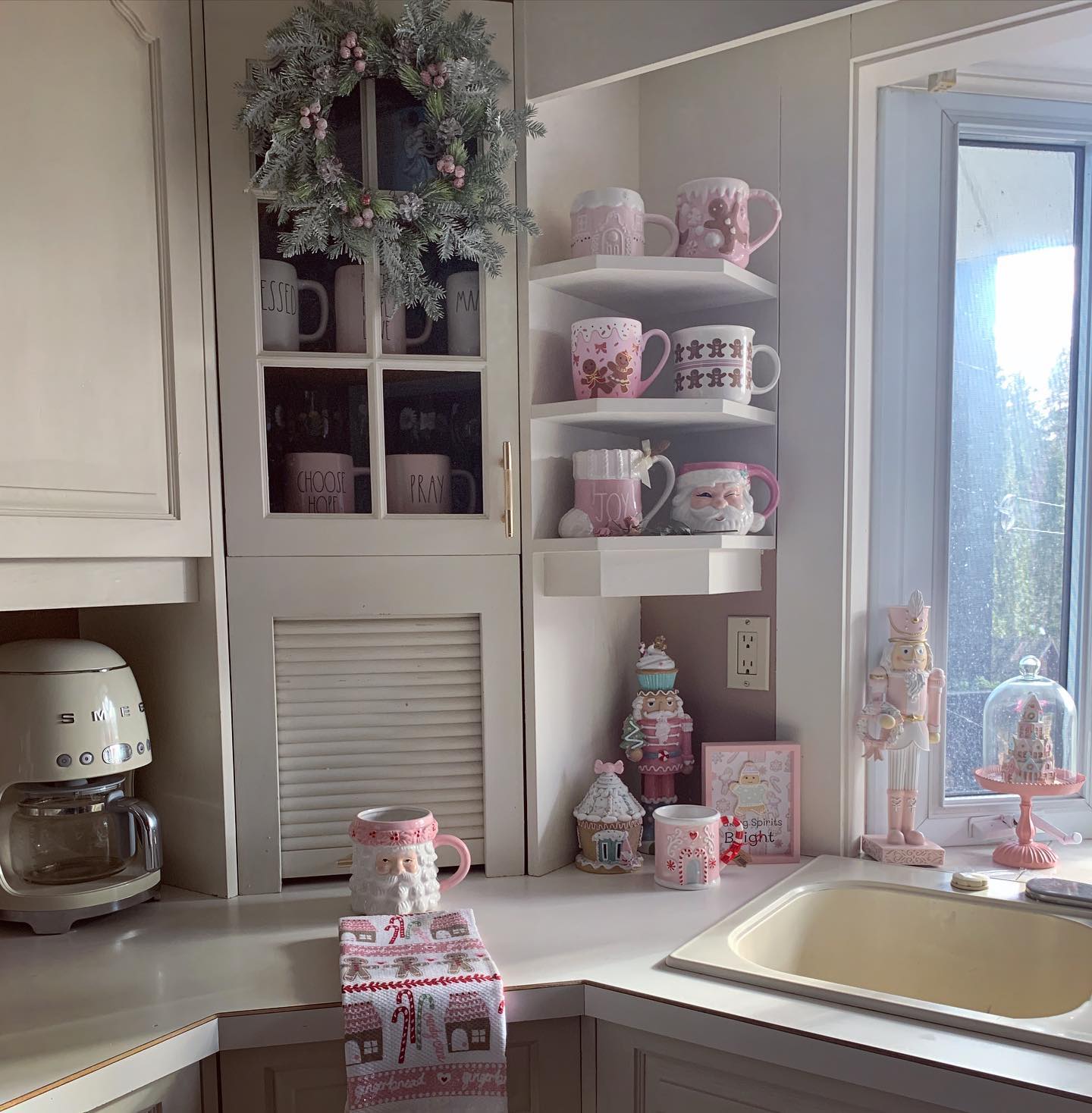 1. Festive Pinecones and Cinnamon Stick Garland Draped Over a Rustic Wooden Mantel