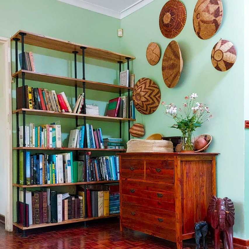 1. a Symphony Of Literature with Geometric Precision: Hexagonal Shelves and Scarlet Accents