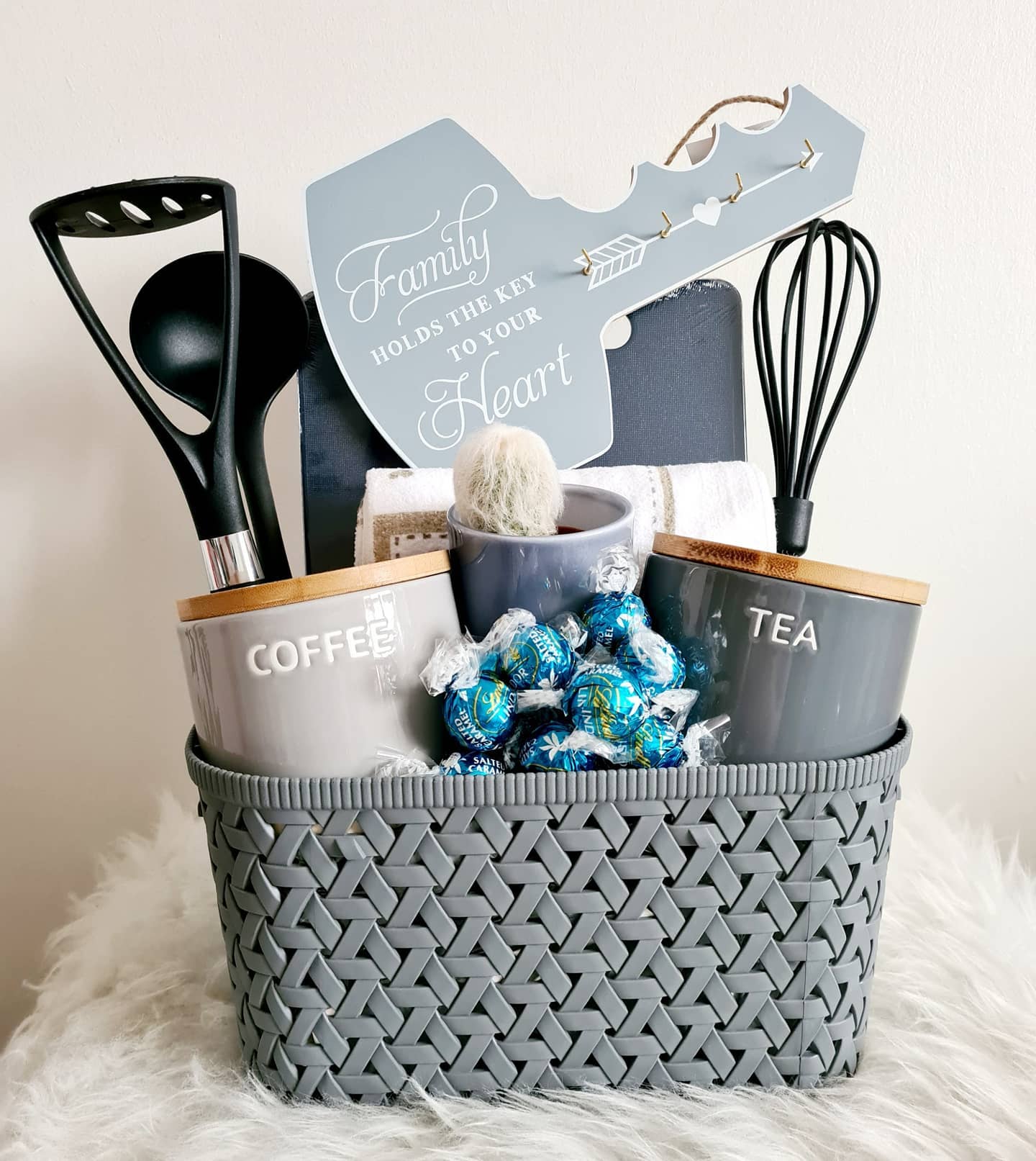 16. a Symphony Of Spices In a Rustic Wicker Basket with Red Ribbon Accents