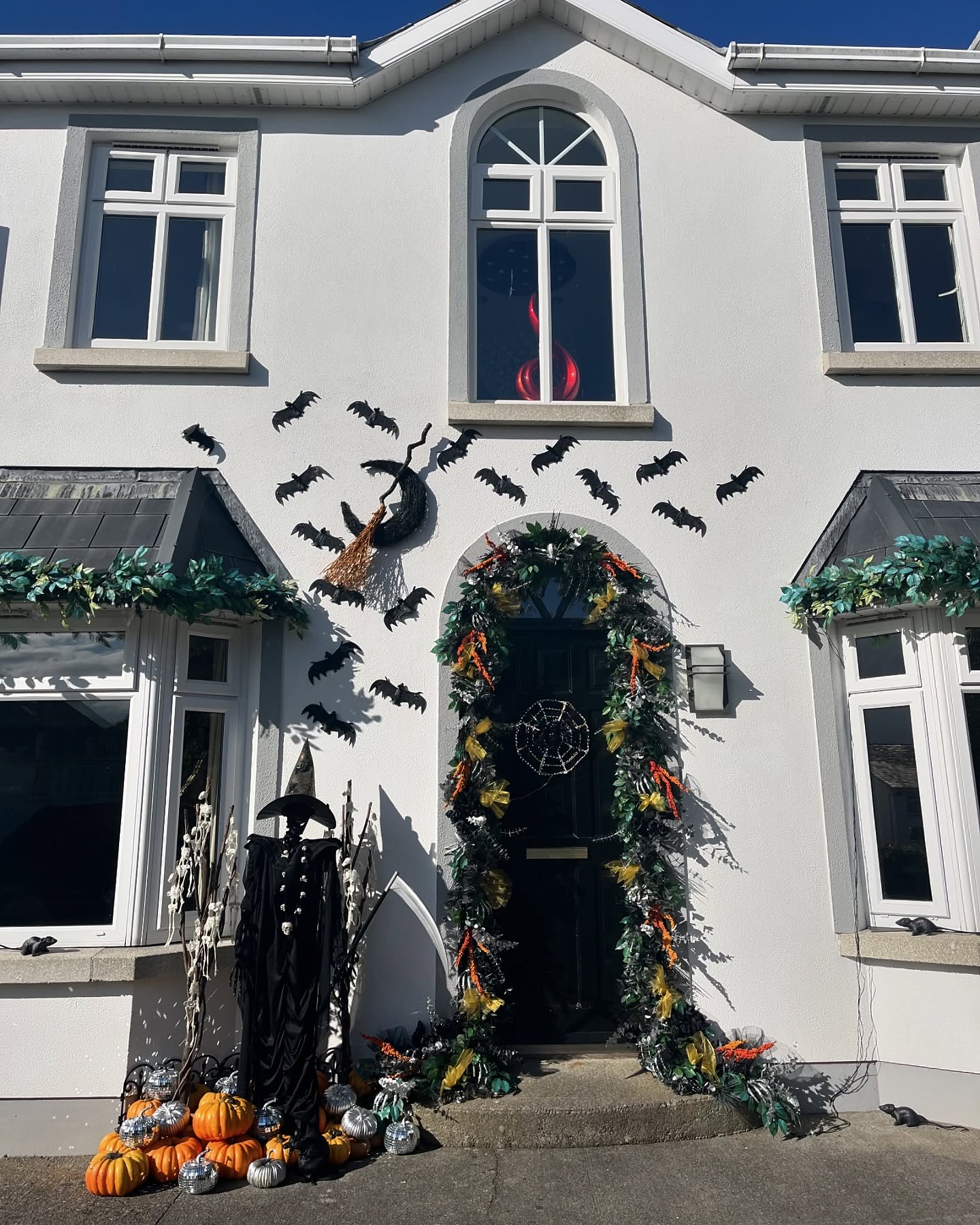 14. Cobweb Canopy and Spider Silhouette Doorway