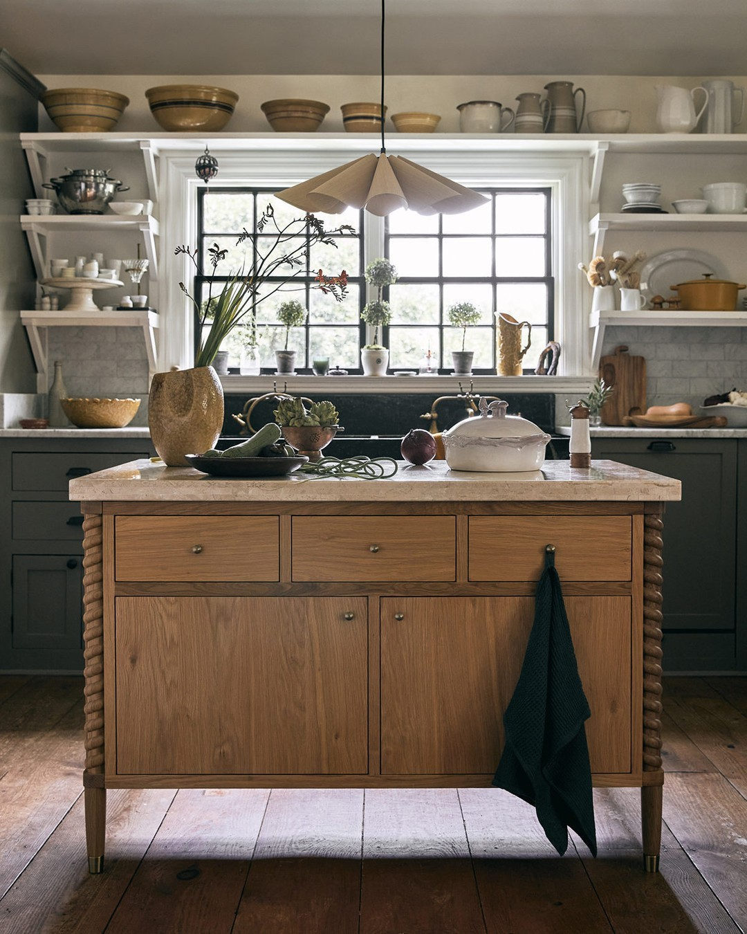 16. Bohemian Dreamscape with Macrame and Succulents Above Kitchen Cabinets
