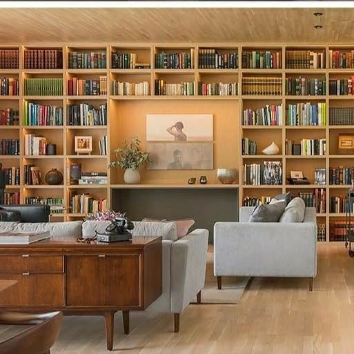 17. a Cascade Of Books: Where Ivy Meets Literature on Maple Shelves