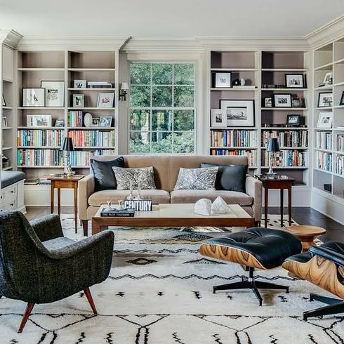 16. Bookshelf Labyrinth with Ladder Access and Eclectic Book Arrangement