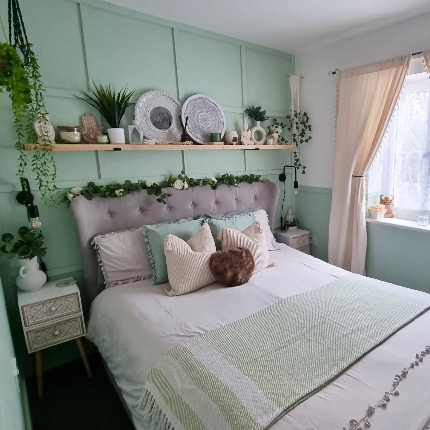 20. Sage Green Canopy Bed with Macrame Dreamcatcher Accent