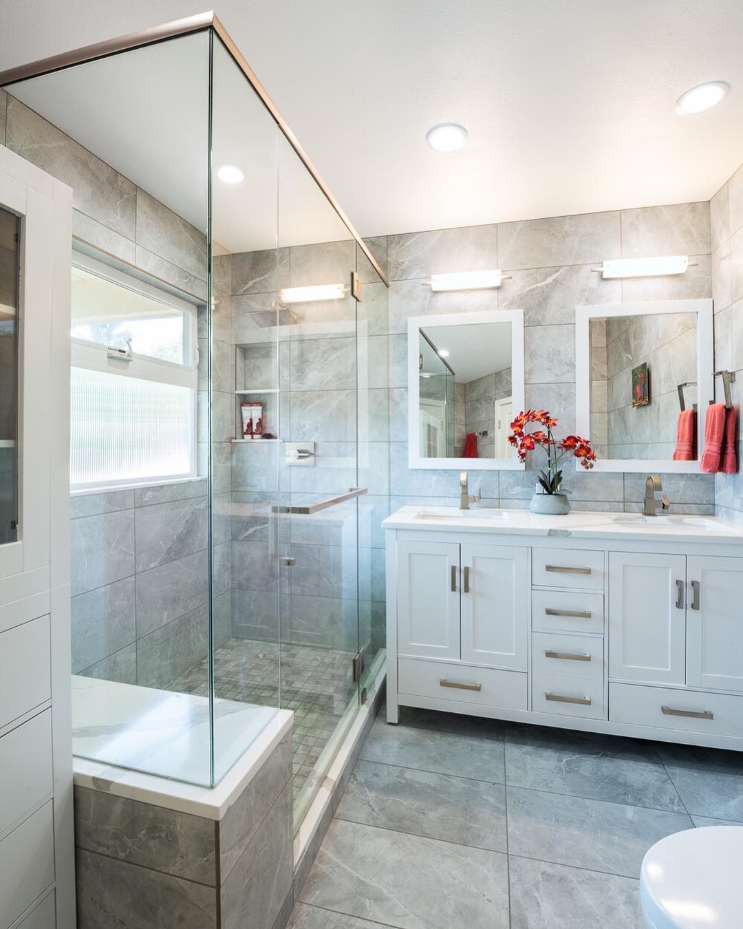 24. Vibrant Turquoise Tiles Meet Industrial Chic with Exposed Brick