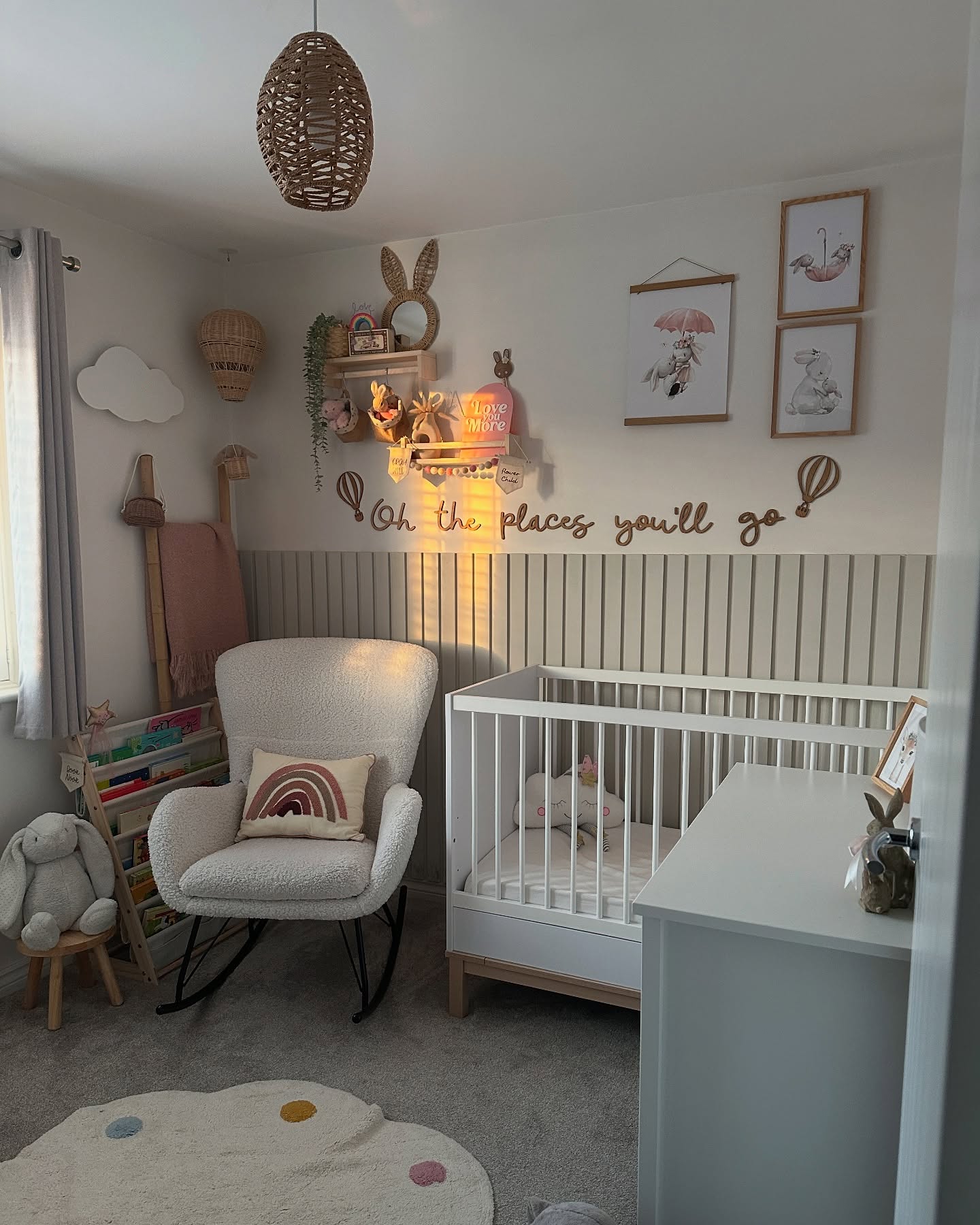 20. Vibrant Jungle Canopy with Whimsical Animal Mobiles Above a Cozy Crib