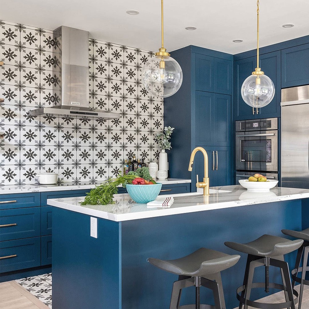 9. Cobalt Cabinets and Copper Pans: a Retro-futuristic Kitchen Fusion