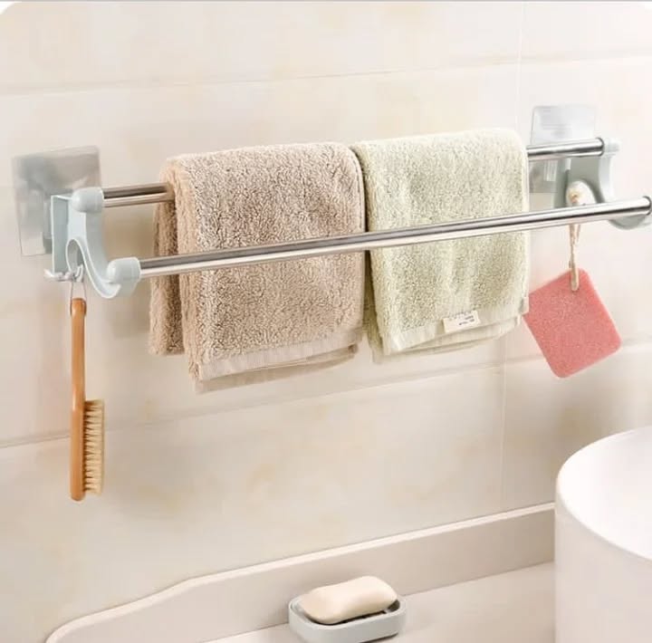 9. Moonlit Chrome Crescent Towel Holder with Geometric Shadow Play