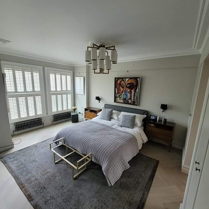 17. Cozy Nook with Vintage Suitcases and Lace Canopy Bed