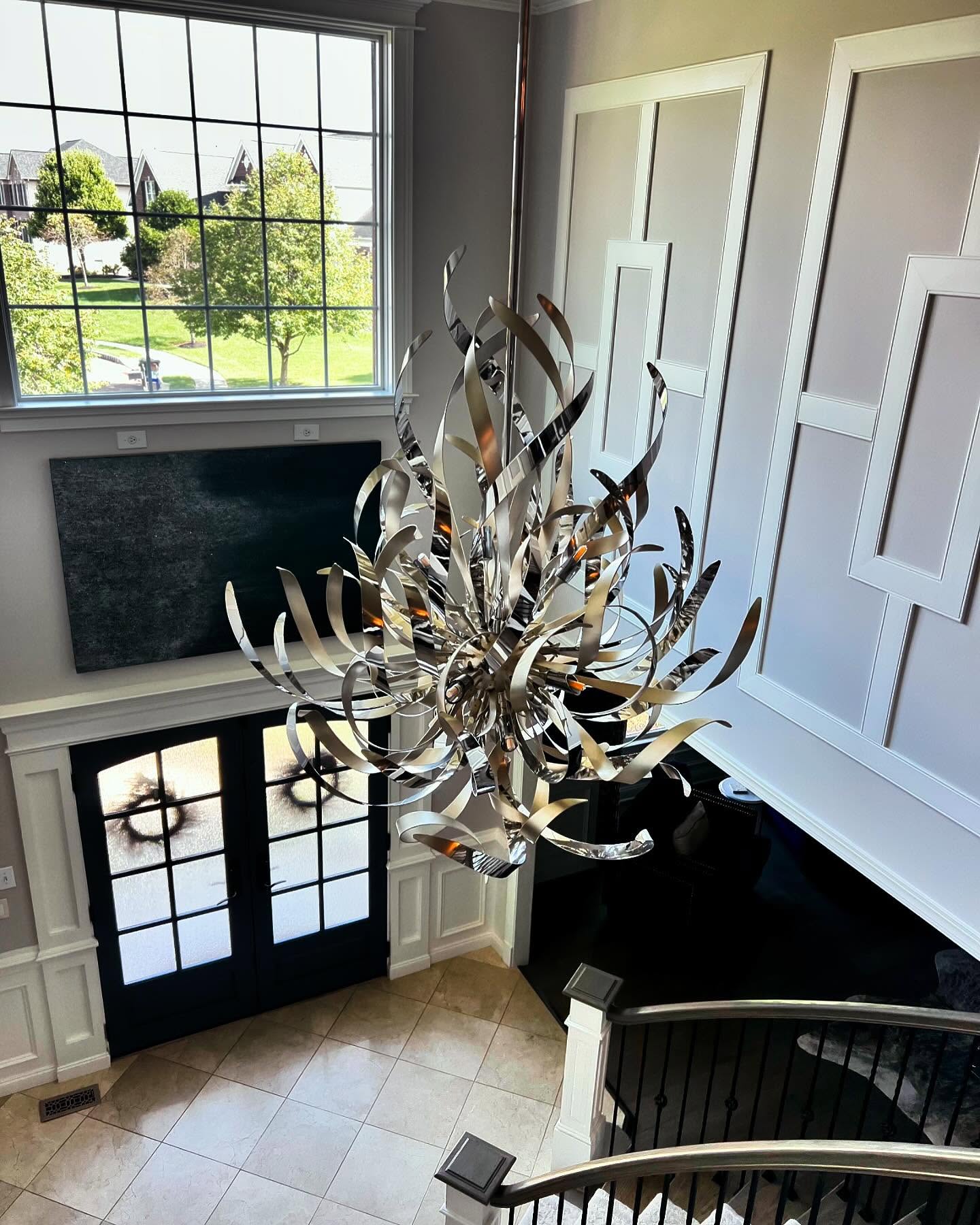 19. a Cascade Of Geometric Shadows from a Triangular Chandelier