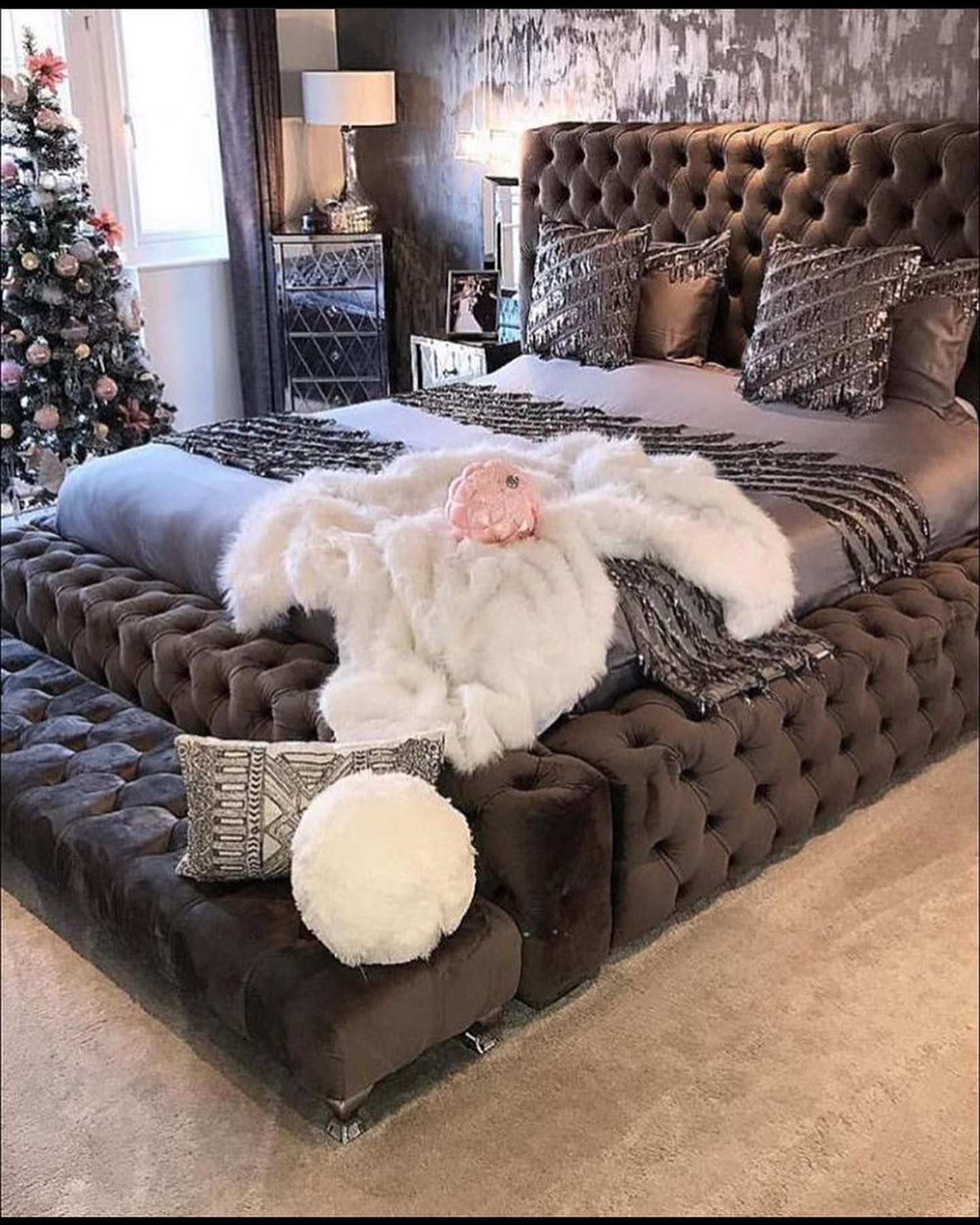 20. Soft Lavender Dream with Macrame Wall Hangings and Vintage Suitcase Nightstand