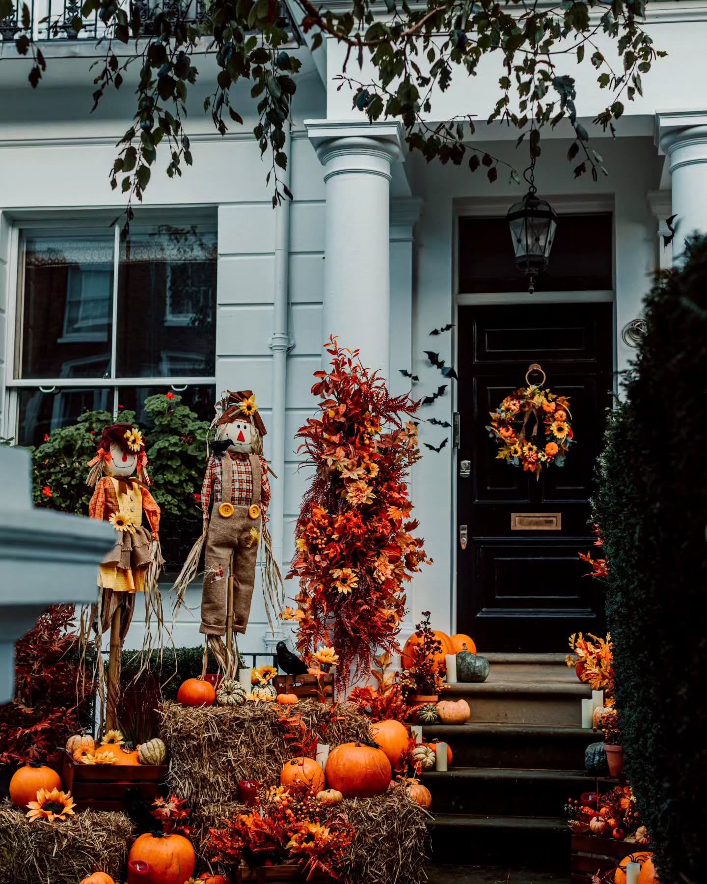 13. Spooky Silhouettes Against a Blood Moon Backdrop