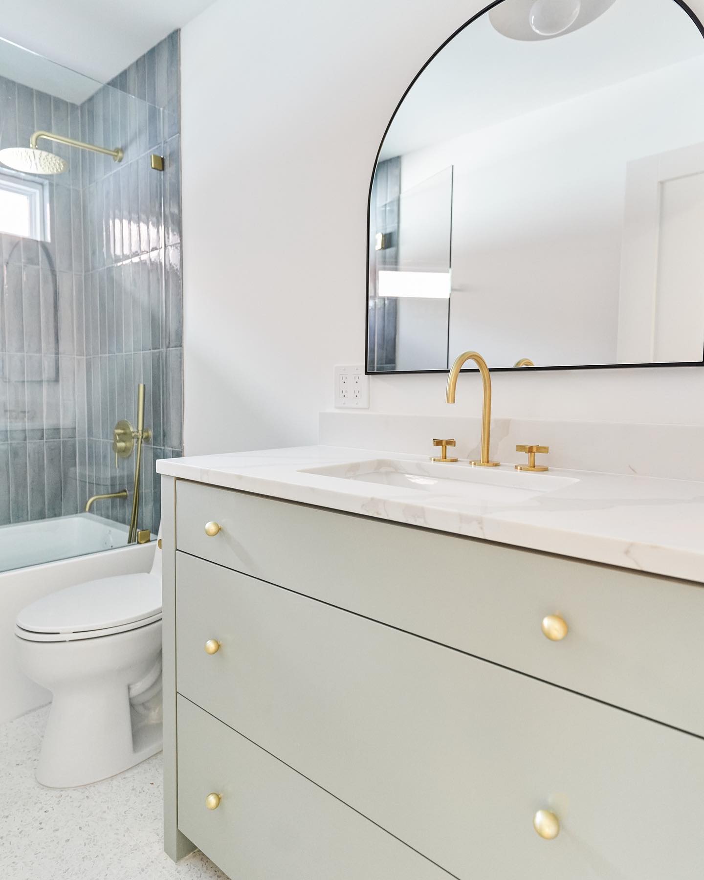 3. Midnight Oasis: the Black and White Mosaic Tile Bathroom