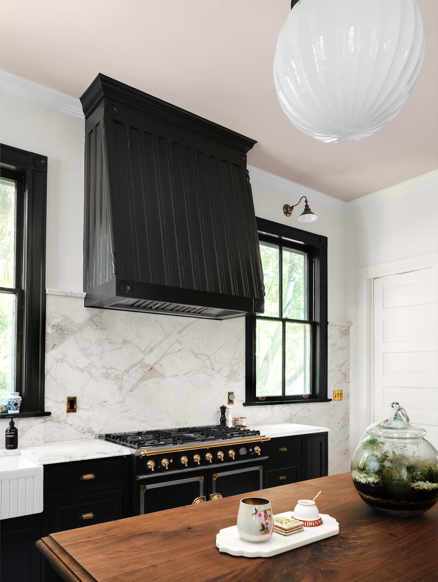 21. Monochrome Mosaic Backsplash with Geometric Shadow Play