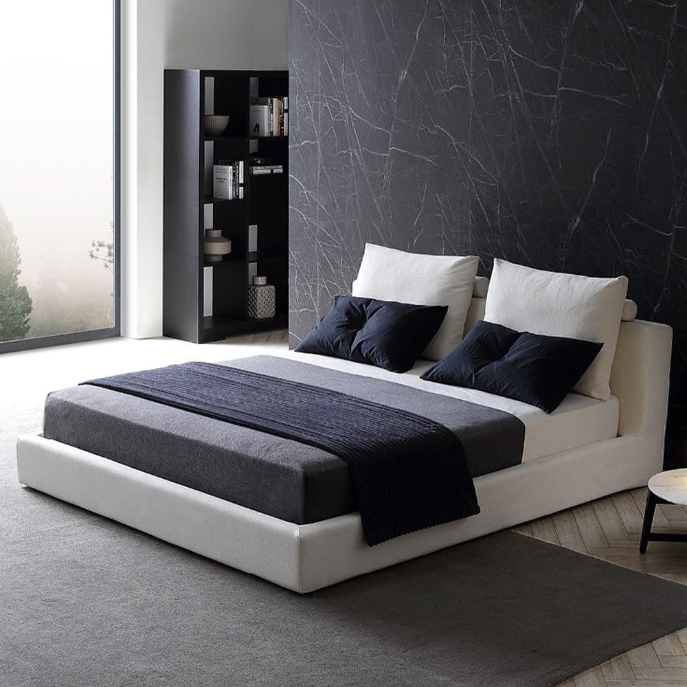 25. Moonlit Waves Bedding Against Geometric Wall Art In a Minimalist Haven