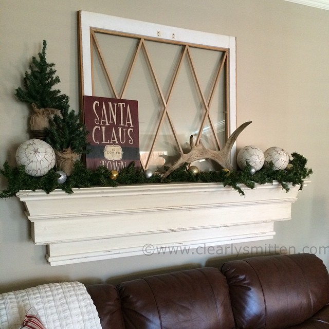 4. Vibrant Geometric Triptych with Emerald Green Accents Above a Minimalist Couch