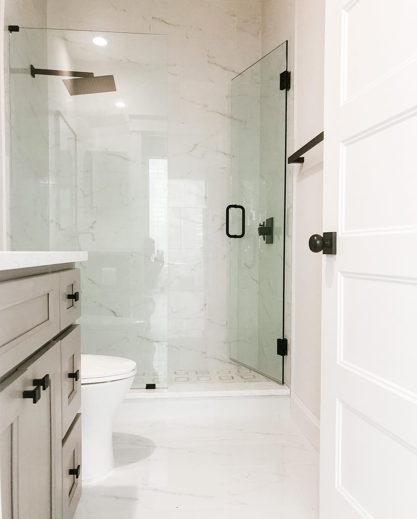 14. Moonlit Mosaic and Wood Fusion: a Budget-friendly Bathroom Retreat