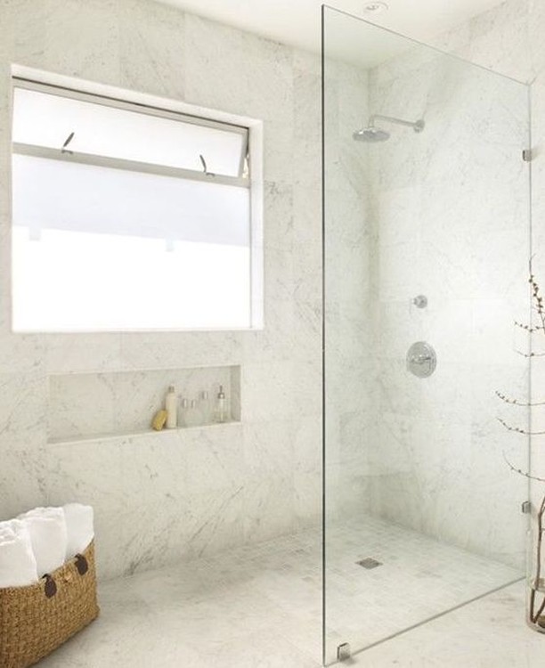 11. the Mosaic Tiled Alcove with Brass Fixtures and Floating Shelf