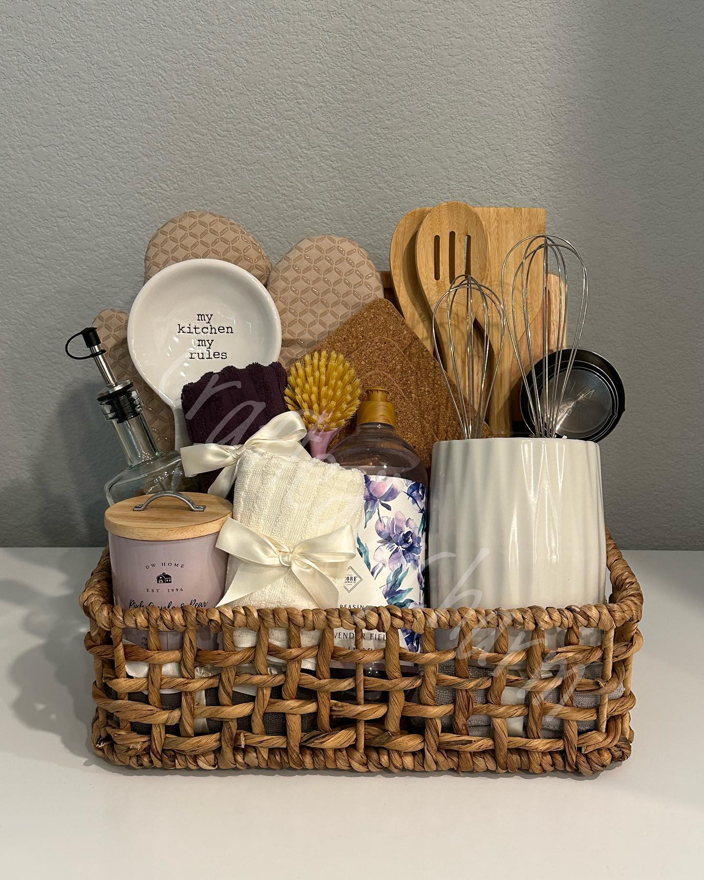 8. Whimsical Whisks and Teal Towels: a Kitchen Gift Basket with a Playful Twist