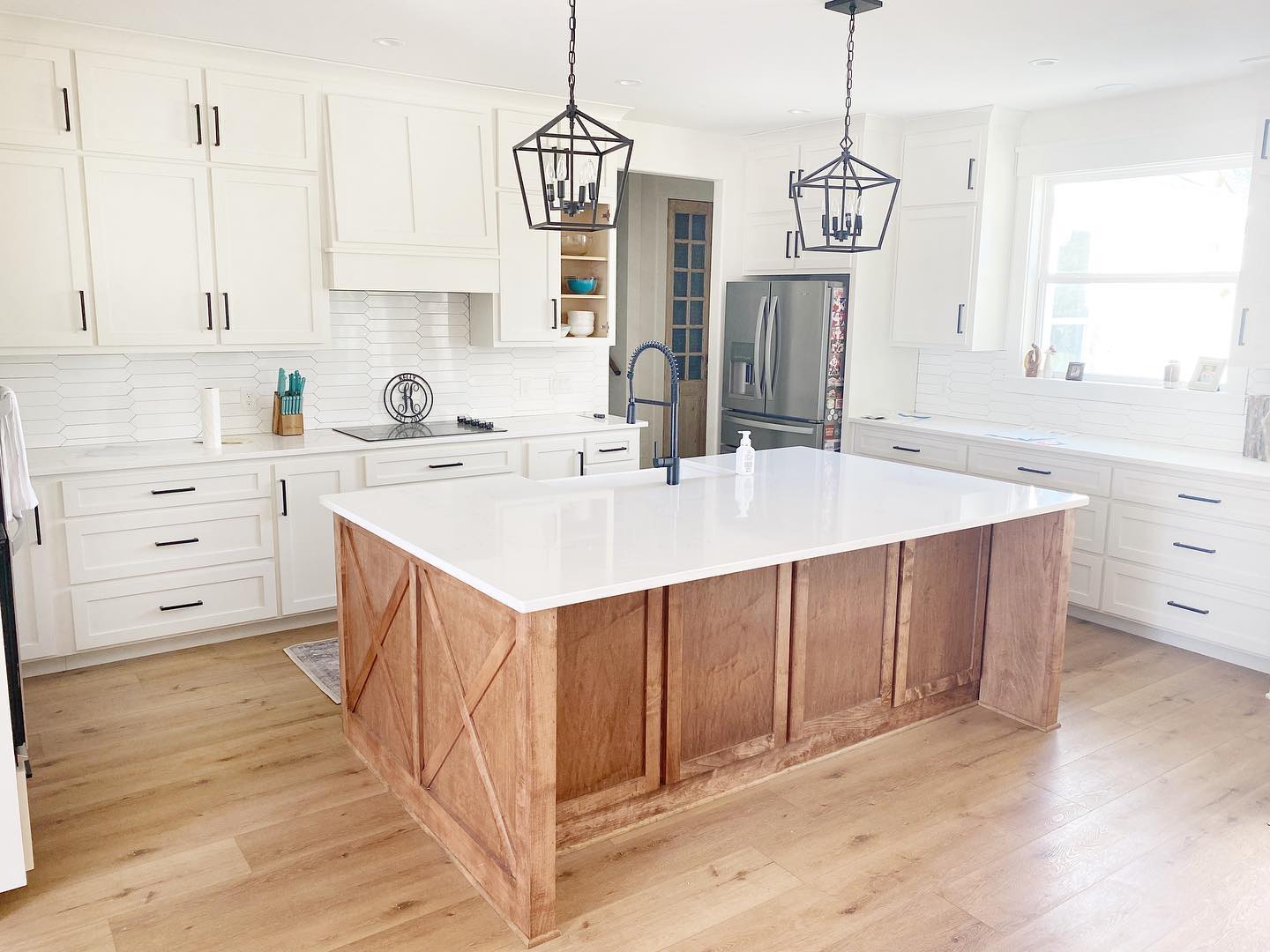 23. the Interlocking Geometric Tiles and Matte White Cabinets Fusion