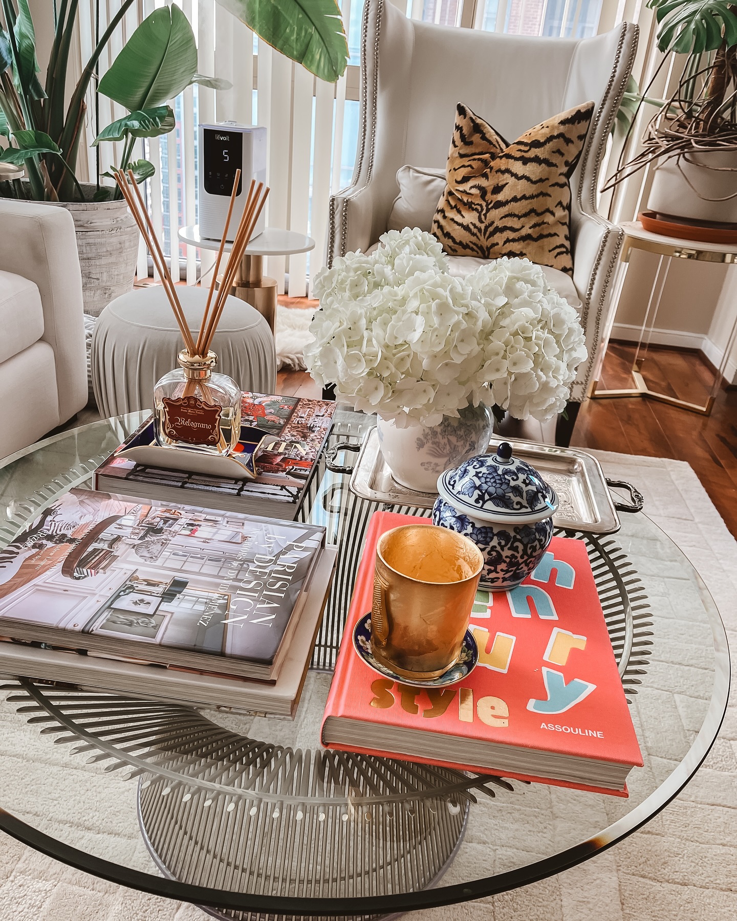 23. the Intricate Dance Of Brass and Wood: a Single Orchid's Spotlight on a Sunlit Table