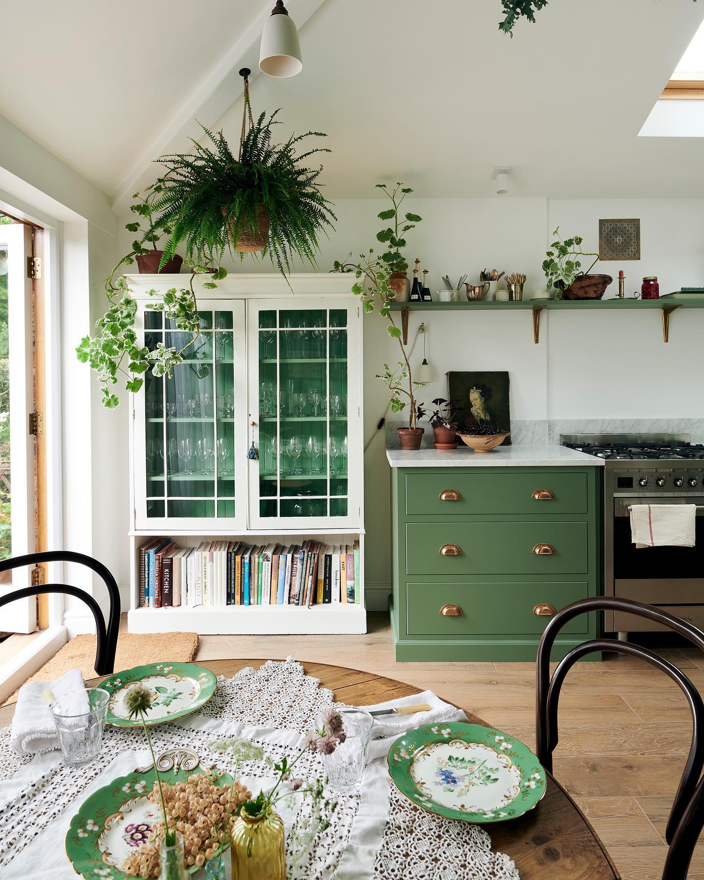 12. Sunlit Serenity: a Kitchen with a View Of Verdant Vines and Weathered Wood