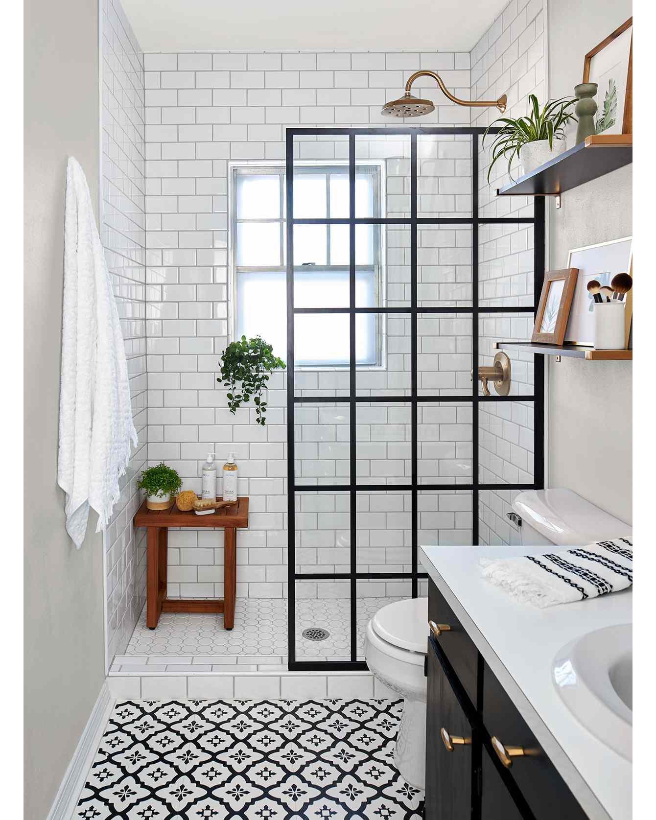 10. the Mosaic Tile Accent Wall with Floating Shelves and Vintage Mirror
