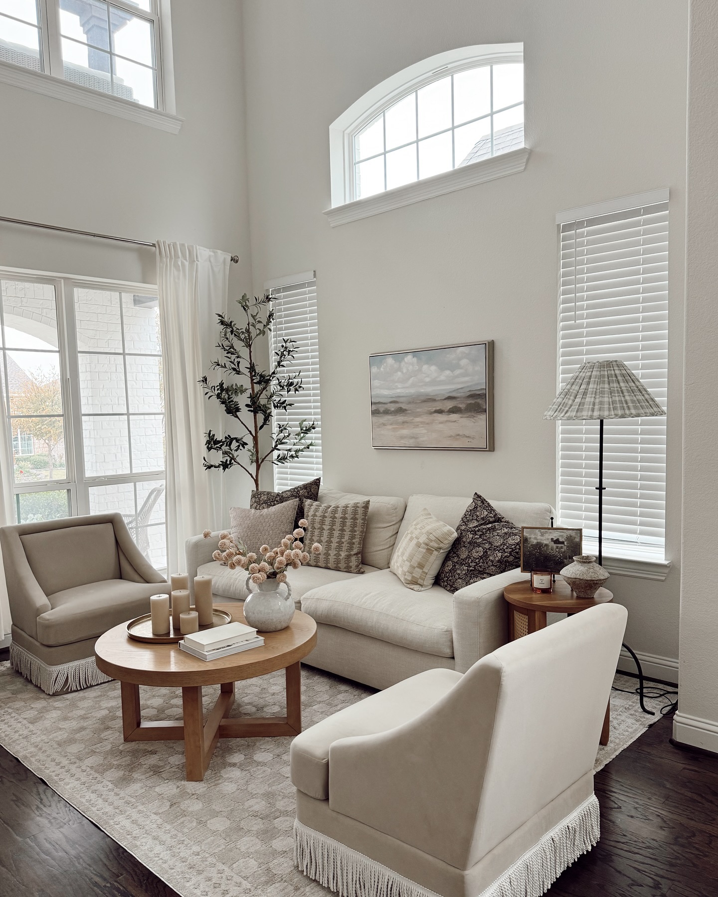 18. Velvet Plum Delight: a Compact Sofa with Rounded Arms and Tufted Back In a Small Living Room