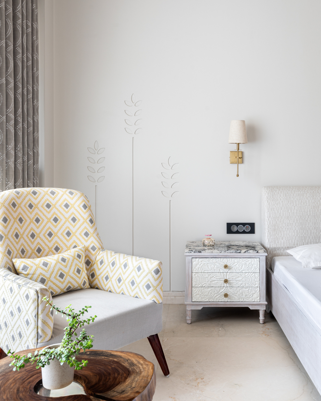 6. a Cornflower Blue Armchair Nestled Between White Bookshelves and a Sunlit Window