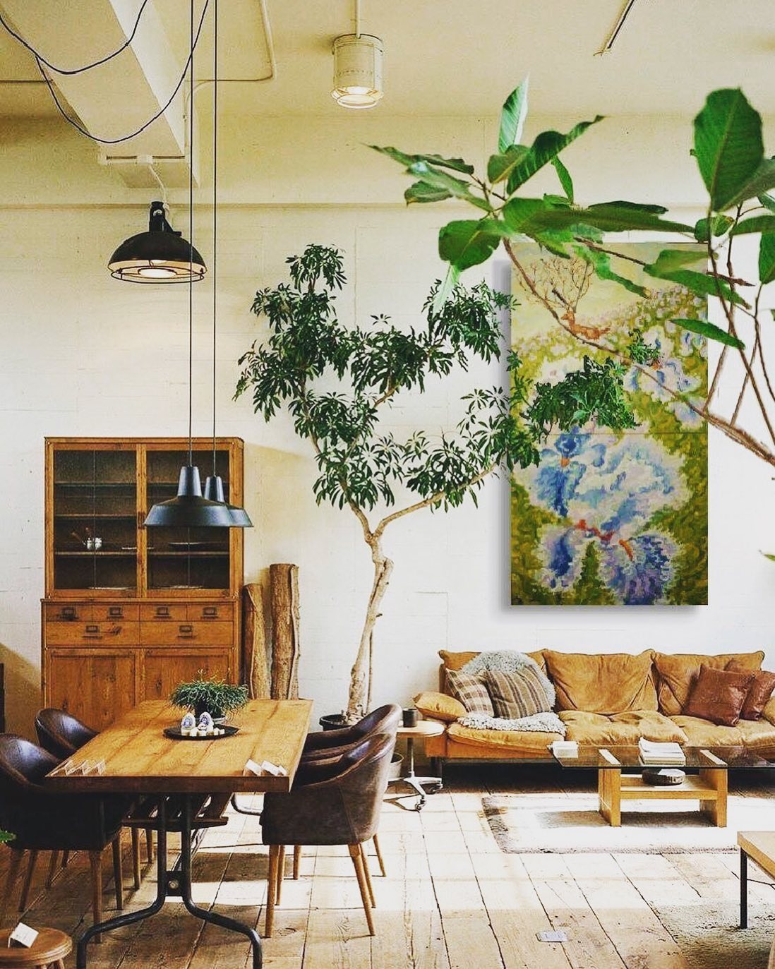 31. the Crimson Velvet Sofa Anchored by a Geometric Rug In a Sunlit Nook