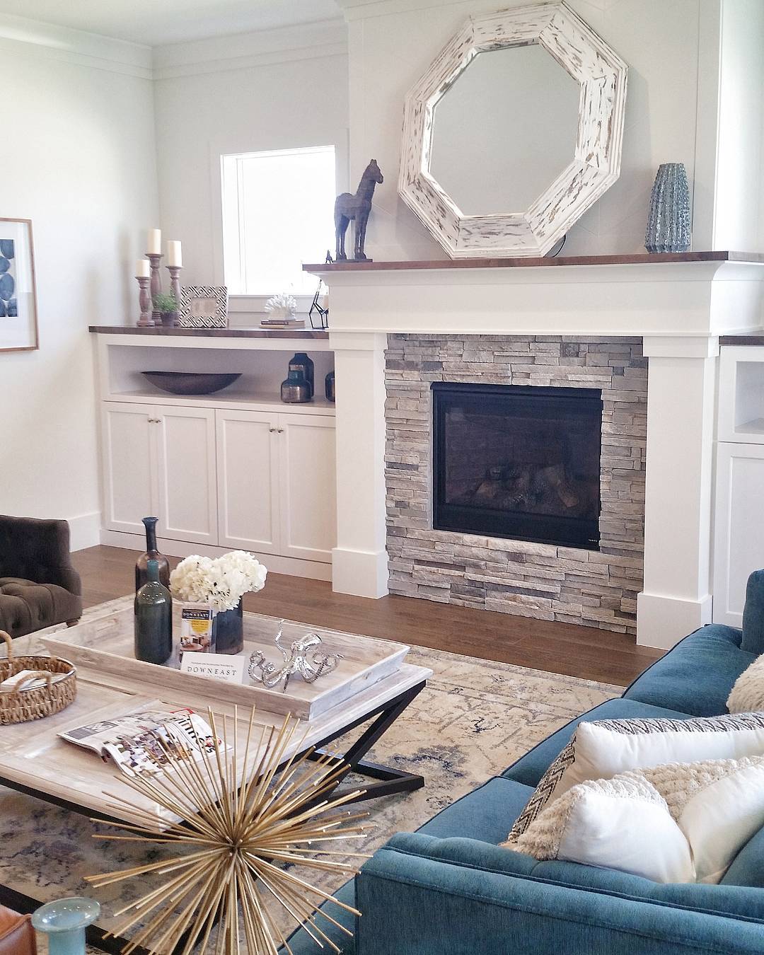 25. Metallic Gold Geometric Symphony Above the Couch