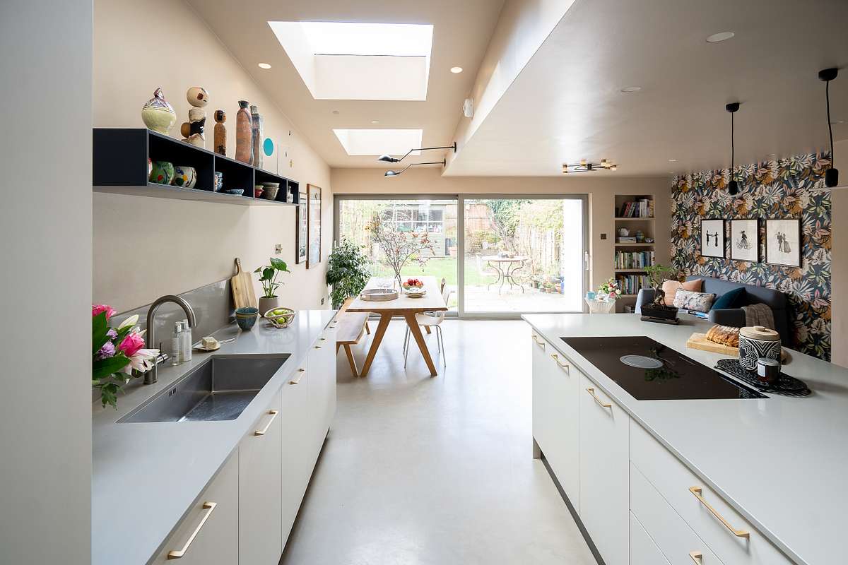 10. a Copper Cauldron and Potted Herbs Perched Above a Rustic Farmhouse Sink