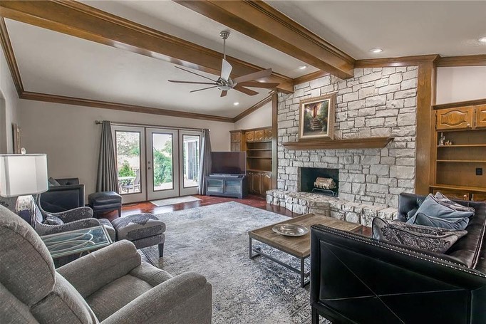 25. Verdant Canopy and Mosaic Tiles: a Sunroom Oasis