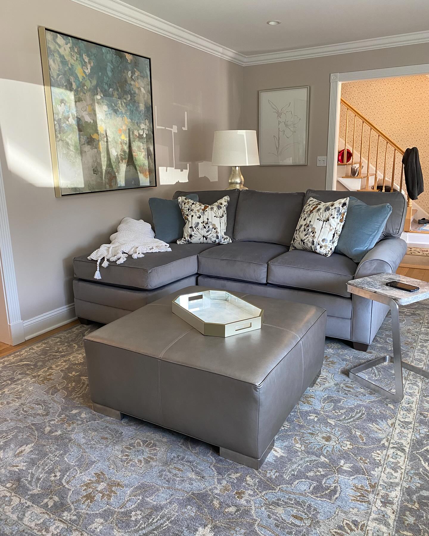 17. Crimson Velvet Embrace: a Compact Sofa with Gold Baroque Legs for the Regal Minimalist