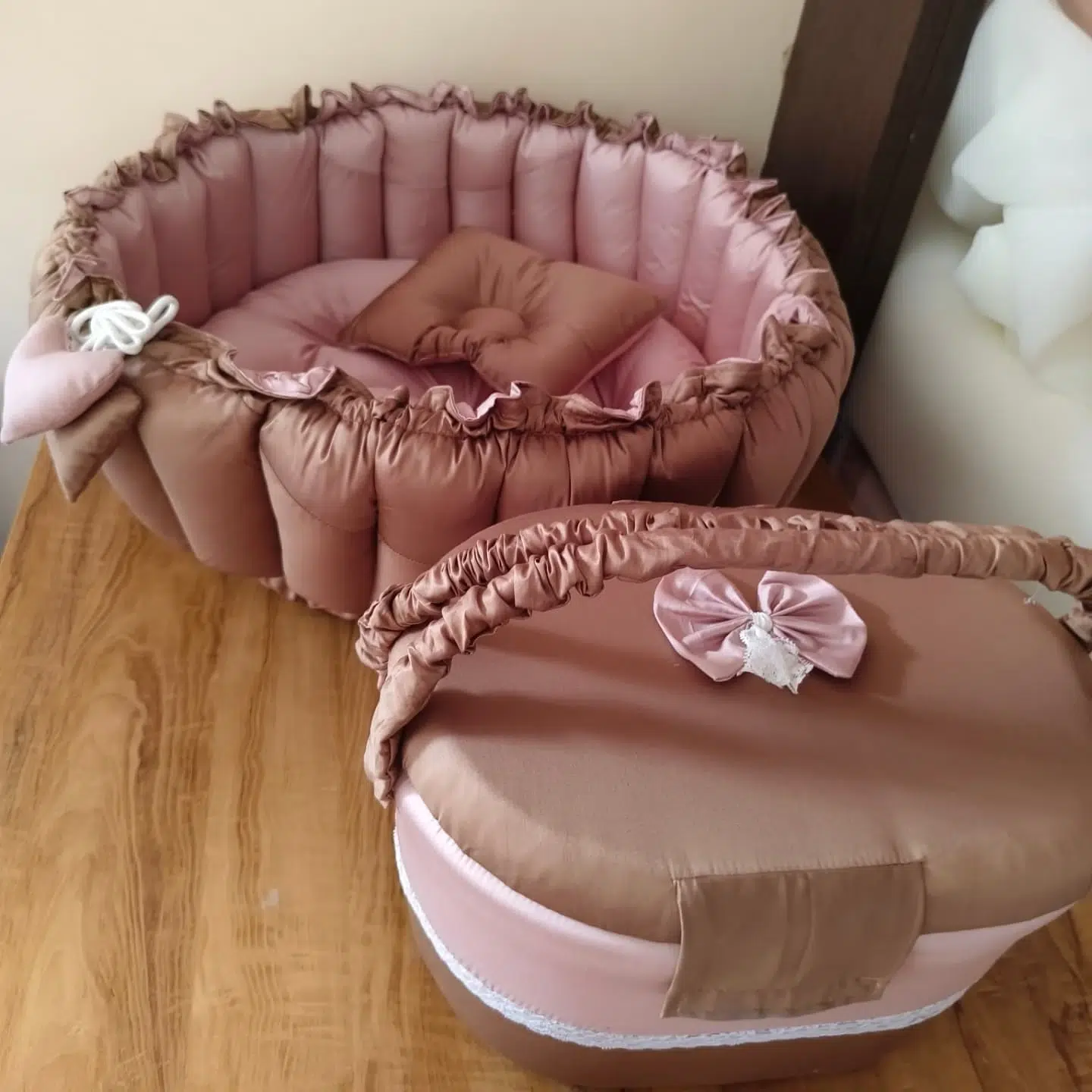 1. Soft Curves and Warm Glow: a Crib with a Wooden Arch and Amber Lighting
