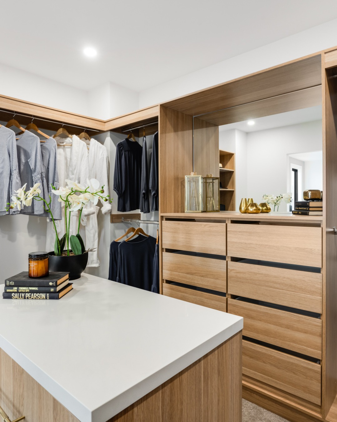 4. Moonlit Serenity Walk-in Wardrobe with Floating Shelves and Velvet Bench