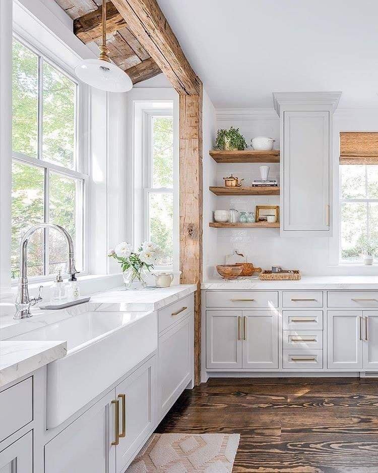 2. a Trio Of White Vases with Dried Botanicals and Vintage Books Above Cabinets