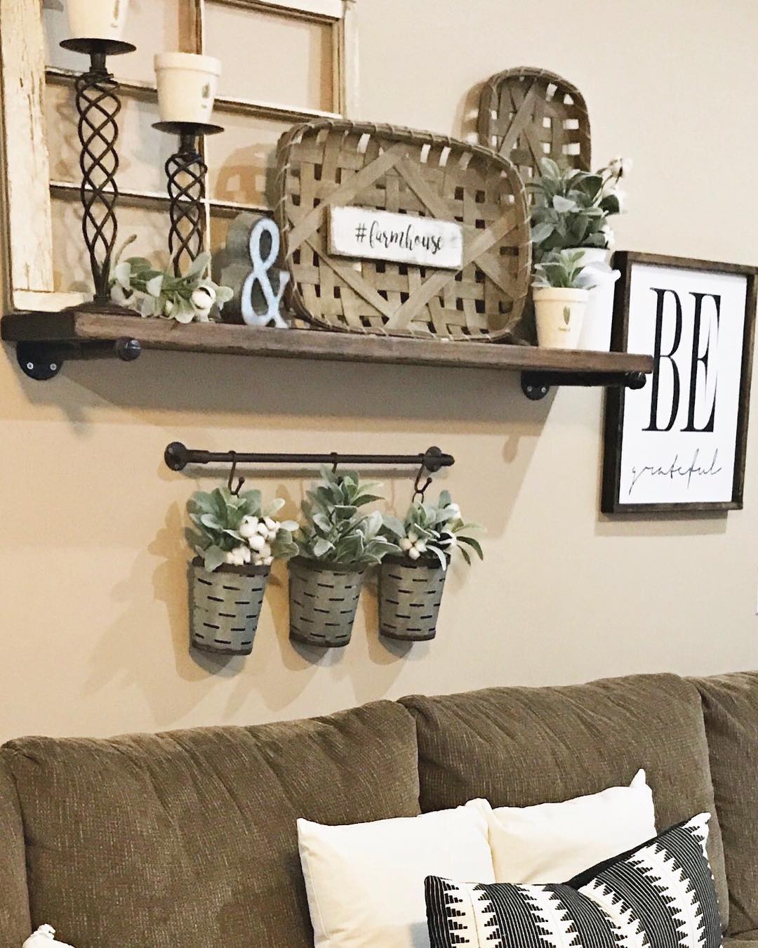 3. Crimson Ribbons and Golden Accents: a Symphony Of Textures Above the Couch