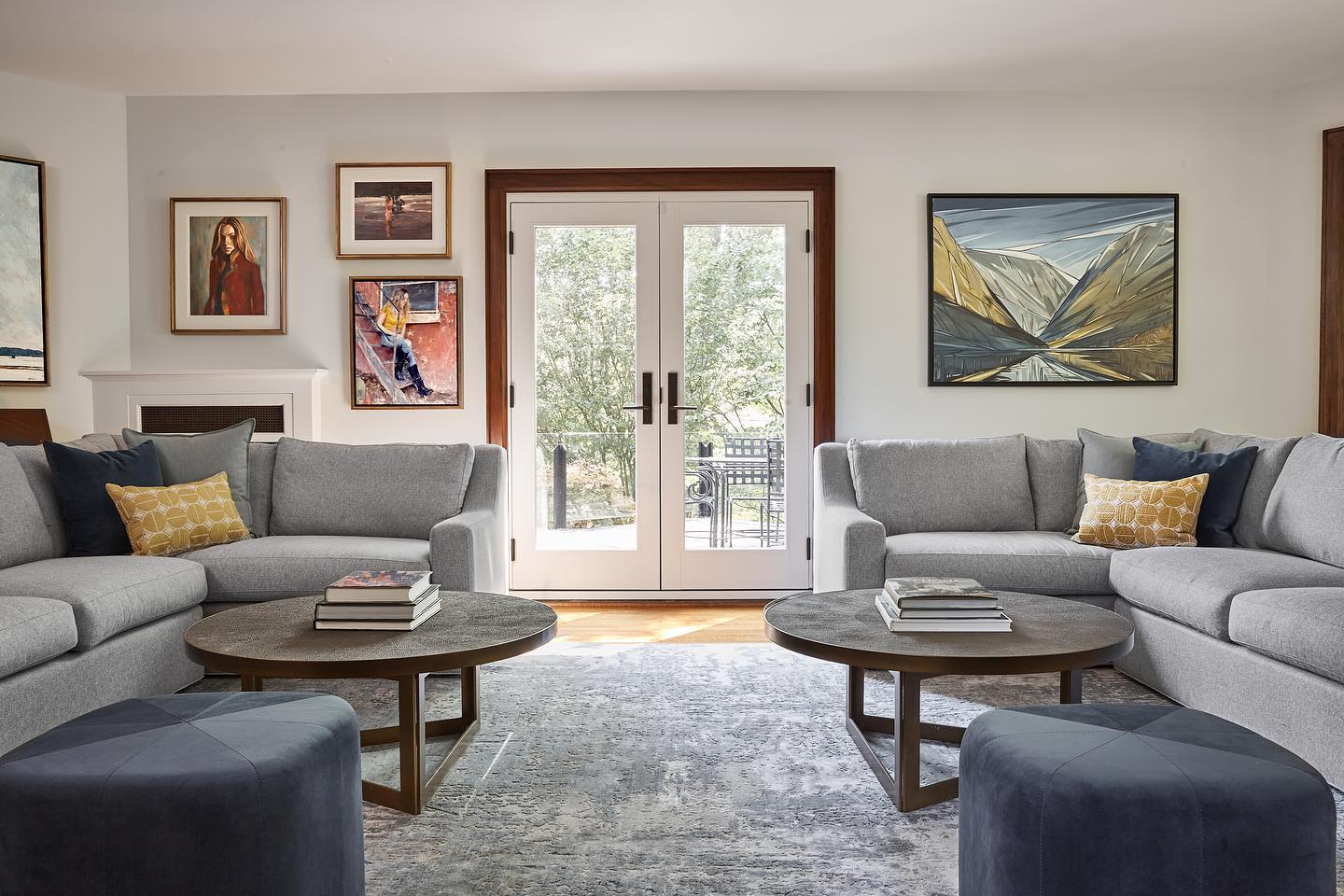 10. a Crimson Velvet Sofa Anchored by Geometric Gold Lamps and a Monochrome Rug