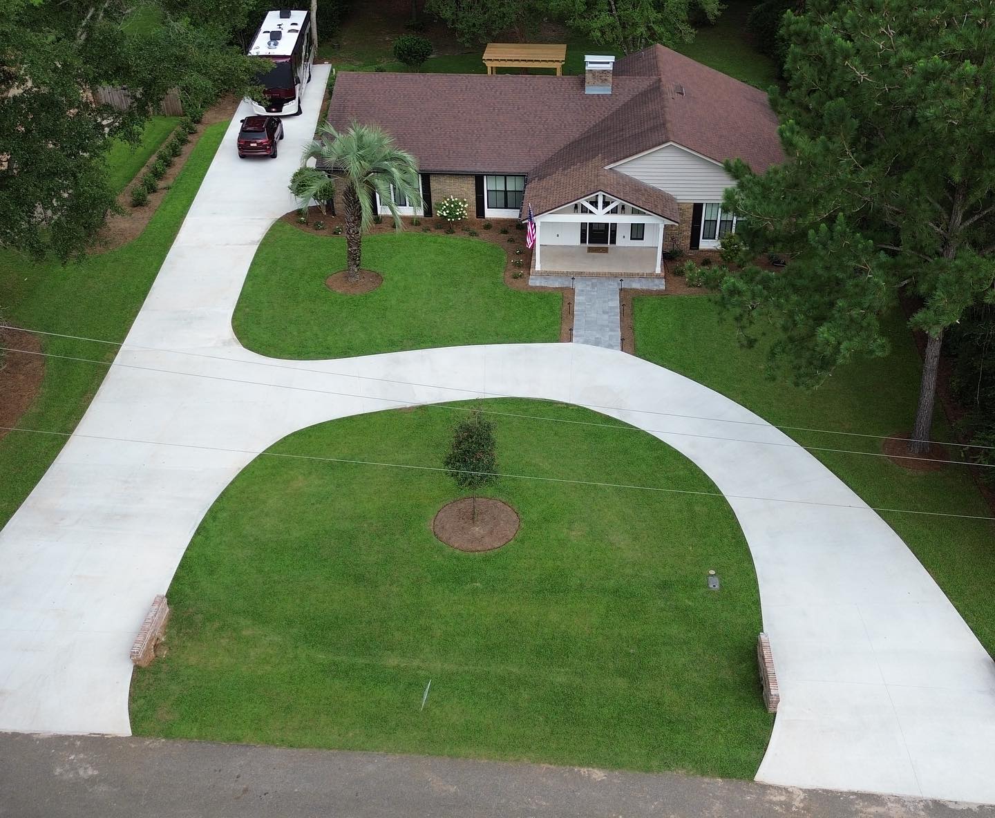 1. Crimson Maple Canopy Over Cobblestone Pathway