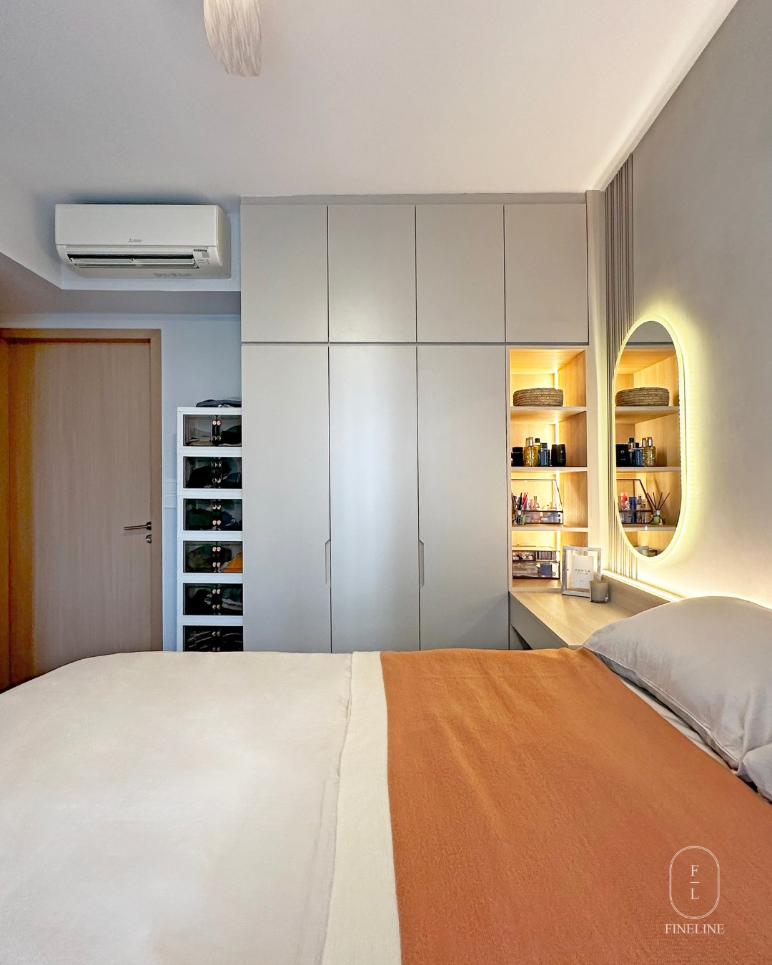 13. Cascading Walnut Shelves with Geometric Cutouts Beside a Hidden Mirror Door
