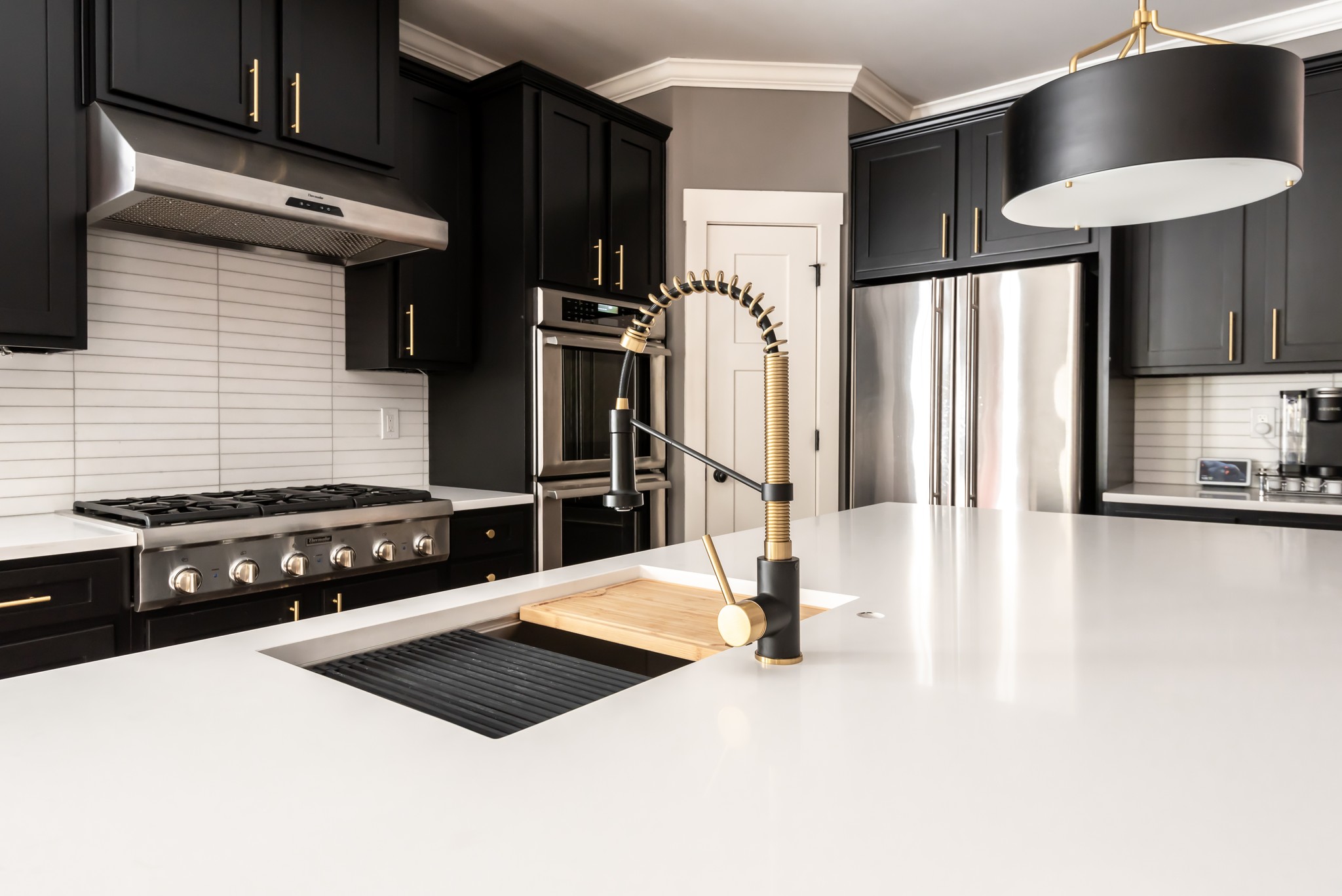 5. the Intersecting Shadows Of a Retrofitted Industrial Sink In Monochrome