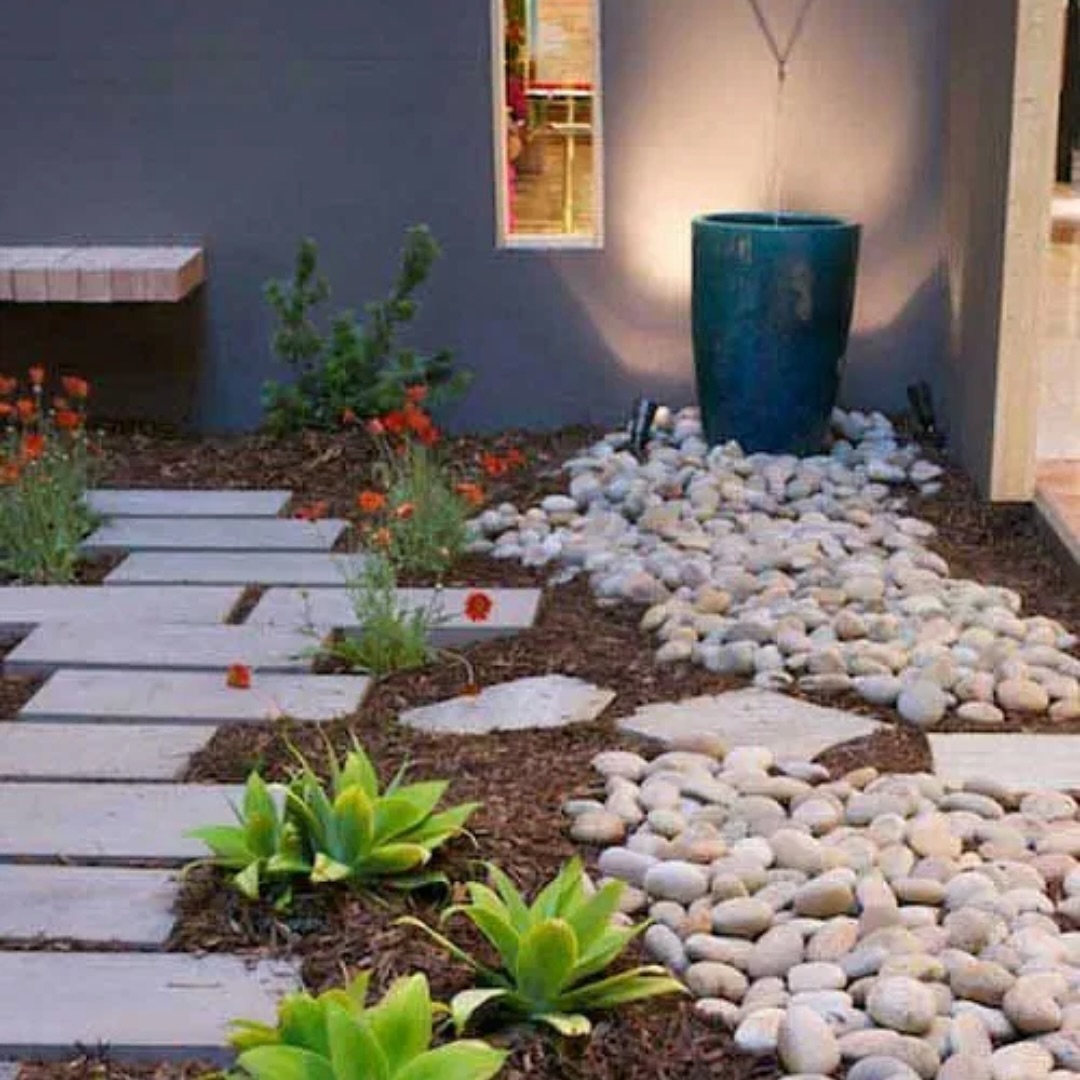 15. a Cascade Of Cobblestones Embracing a Weeping Willow