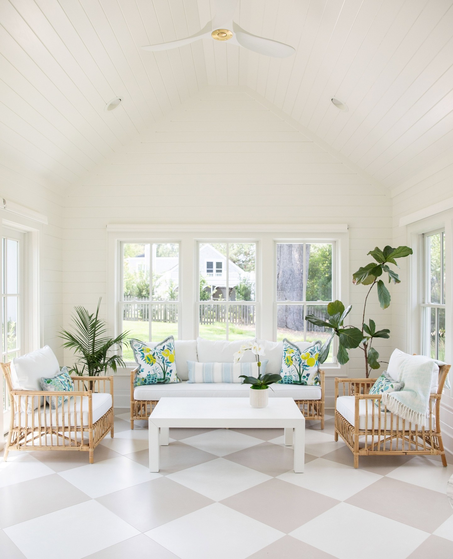 14. Sunlit Haven with Wicker Serenity and Verdant Vistas