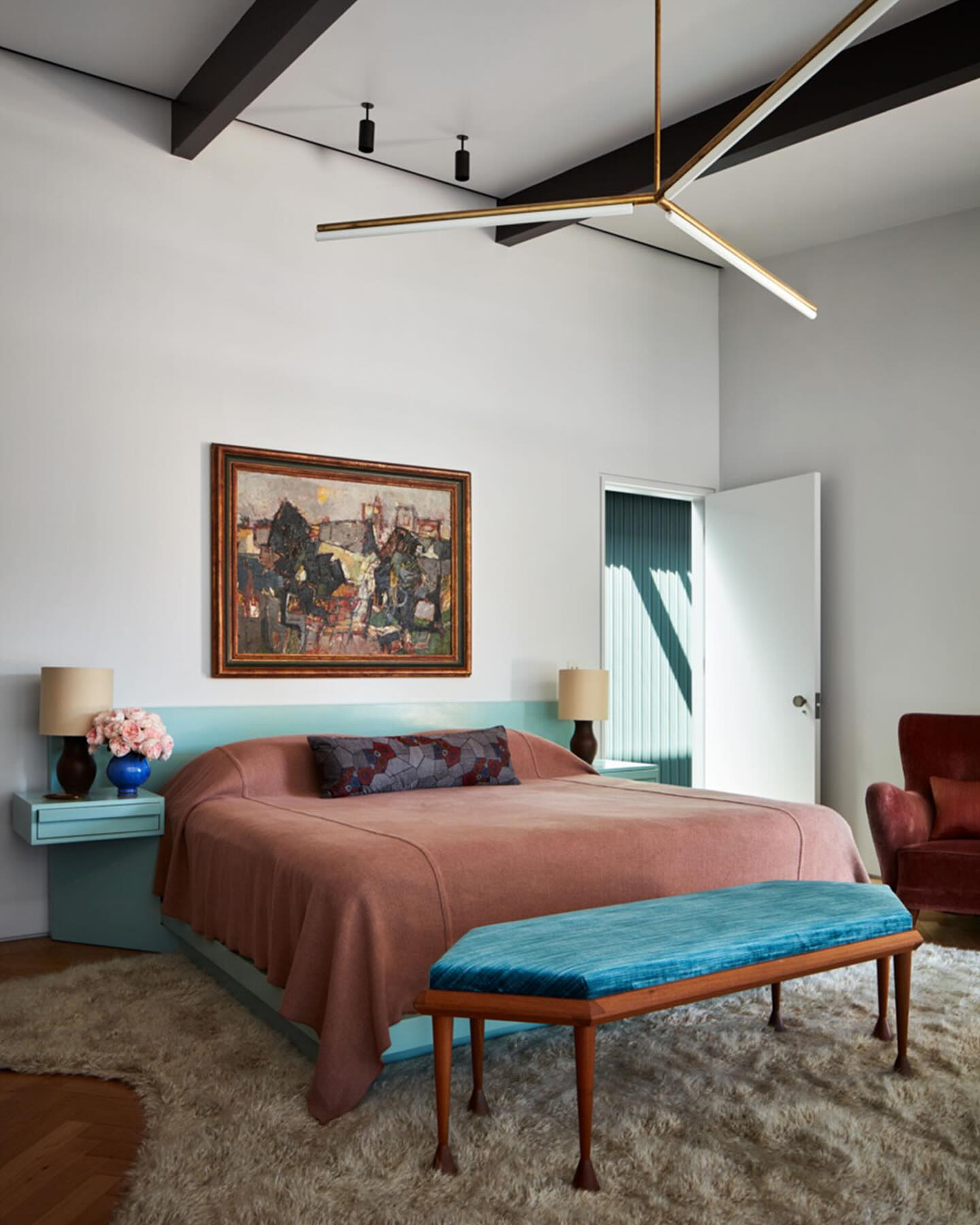 26. Vibrant Geometric Mosaic Underneath a Floating Bed Frame